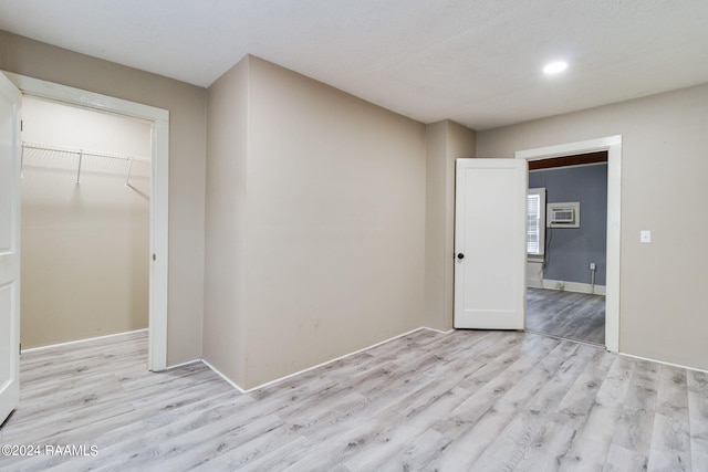 312 Hobson St, Lafayette, LA 70501 - unfurnished bedroom featuring light wood-style flooring, a closet, recessed lighting, and baseboards