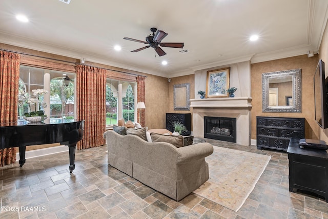 104 Avallach Dr, Lafayette, LA 70503 - living area featuring stone tile floors, a ceiling fan, recessed lighting, a glass covered fireplace, and ornamental molding