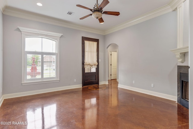 103 Swallows Pass, Carencro, LA 70520 - unfurnished living room with arched walkways, a fireplace, ceiling fan, baseboards, and crown molding