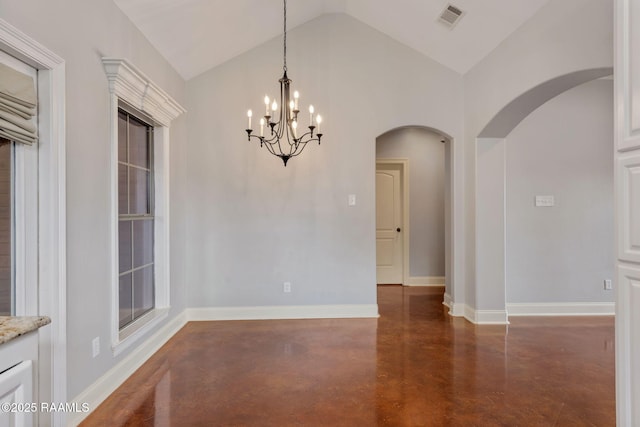 103 Swallows Pass, Carencro, LA 70520 - unfurnished room with arched walkways, vaulted ceiling, concrete floors, a chandelier, and baseboards