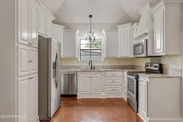 103 Swallows Pass, Carencro, LA 70520 - kitchen with stainless steel appliances, a sink, a chandelier, white cabinetry, and lofted ceiling
