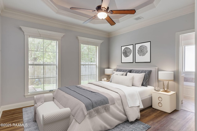 103 Swallows Pass, Carencro, LA 70520 - bedroom featuring wood finished floors, ornamental molding, a tray ceiling, and a ceiling fan
