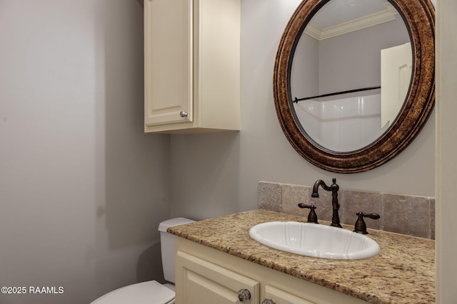 103 Swallows Pass, Carencro, LA 70520 - bathroom with vanity, toilet, and ornamental molding