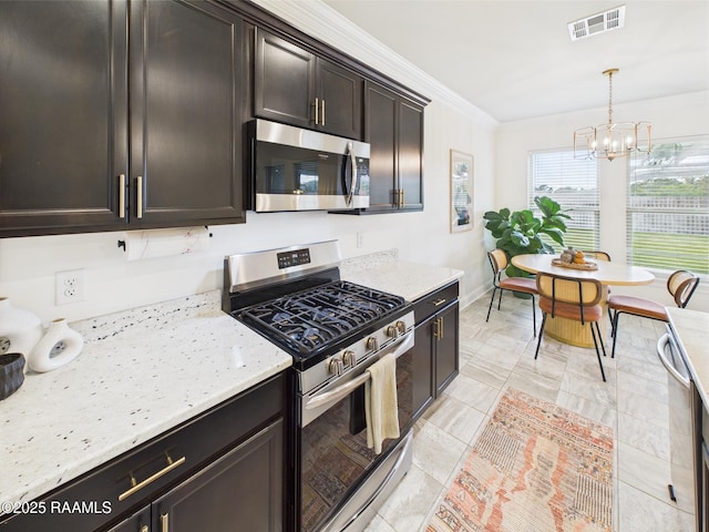 143 Melanie Rose Dr, Maurice, LA 70555 - kitchen featuring stainless steel appliances, a chandelier, crown molding, light stone countertops, and decorative light fixtures