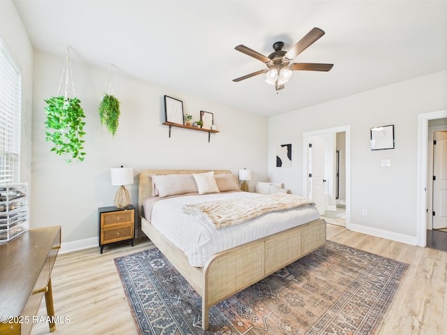 143 Melanie Rose Dr, Maurice, LA 70555 - bedroom with light wood-style floors, baseboards, and ceiling fan
