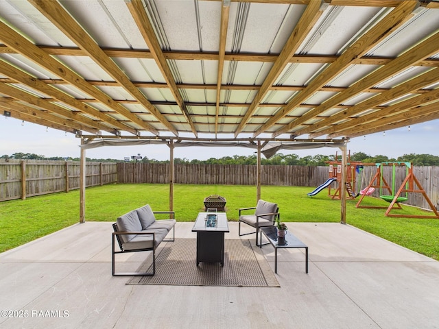 143 Melanie Rose Dr, Maurice, LA 70555 - view of patio / terrace featuring a playground and an outdoor fire pit