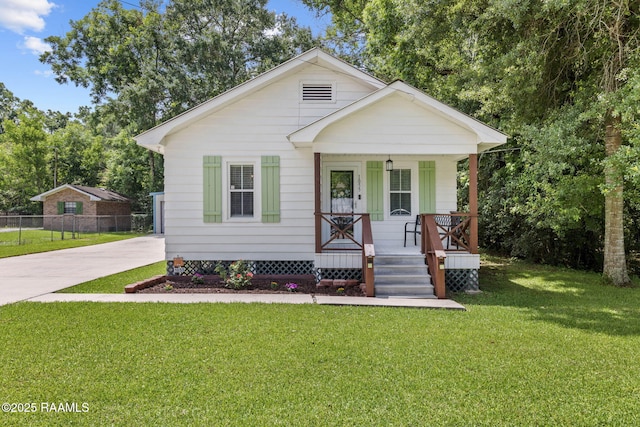 1055 Mason Rd, Arnaudville, LA 70512 - bungalow featuring a porch and concrete driveway