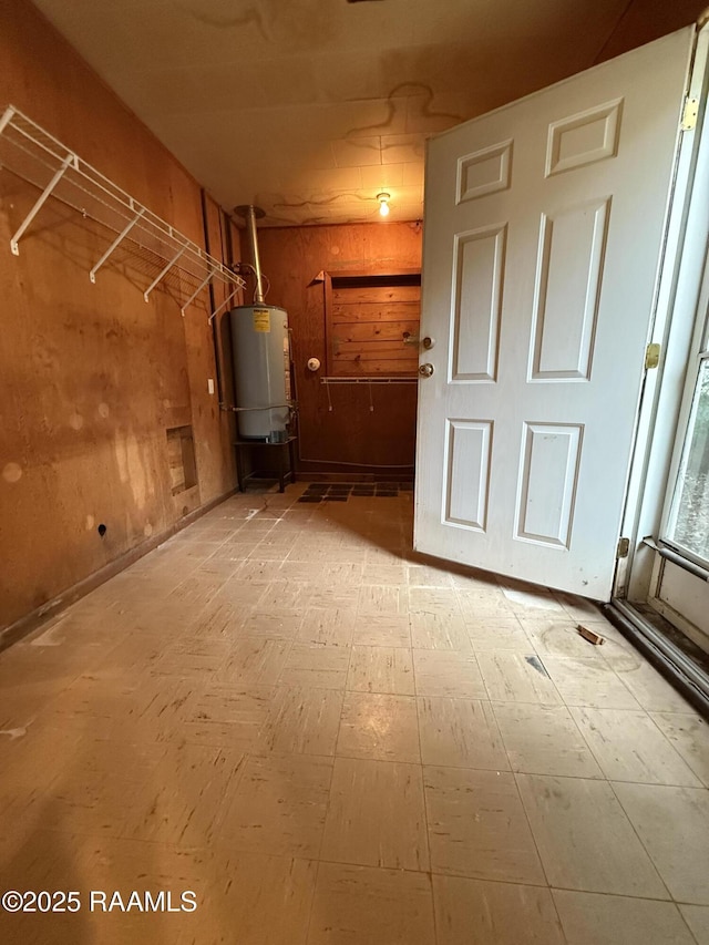2015 Cummings St, Opelousas, LA 70570 - laundry area with gas water heater and light floors