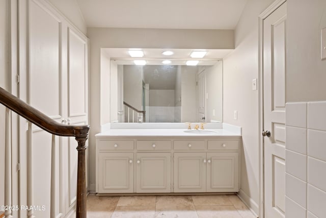 1414 E Bayou Pkwy, Lafayette, LA 70508 - full bathroom with vanity, baseboards, and tile patterned floors