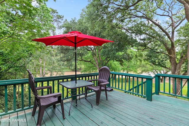 1414 E Bayou Pkwy, Lafayette, LA 70508 - wooden deck with view of wooded area