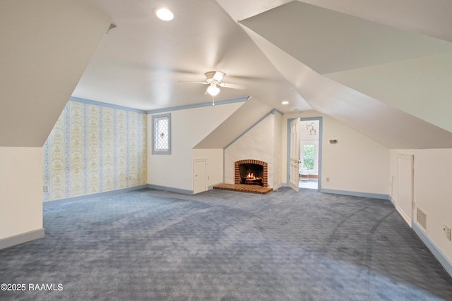 1414 E Bayou Pkwy, Lafayette, LA 70508 - bonus room with carpet flooring, ceiling fan, vaulted ceiling, baseboards, and a brick fireplace
