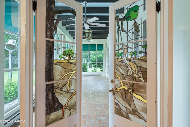 1414 E Bayou Pkwy, Lafayette, LA 70508 - doorway with brick floors and a ceiling fan