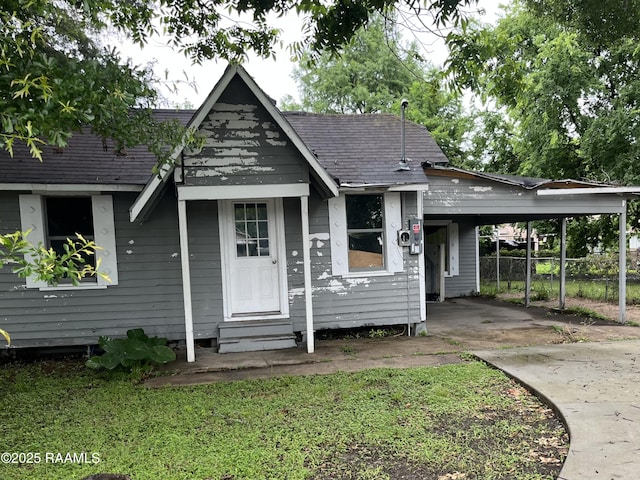 223 Lafayette St, Lafayette, LA 70501 - view of front of property featuring entry steps, concrete driveway, and an attached carport
