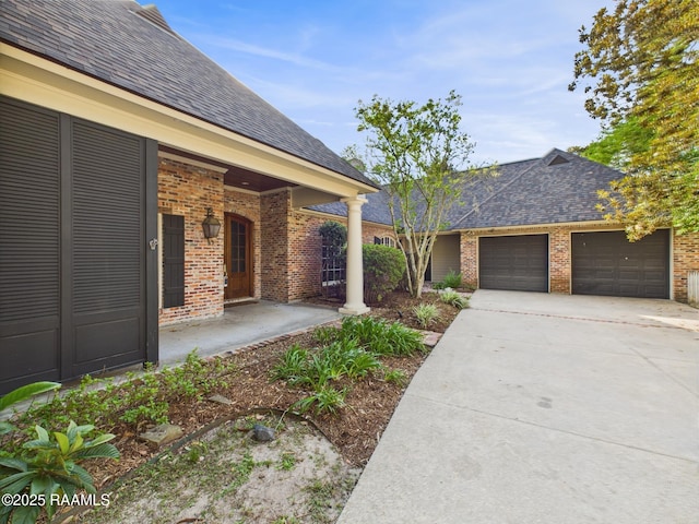 105 Oak Aly, Lafayette, LA 70508 - covered porch with a garage and concrete driveway