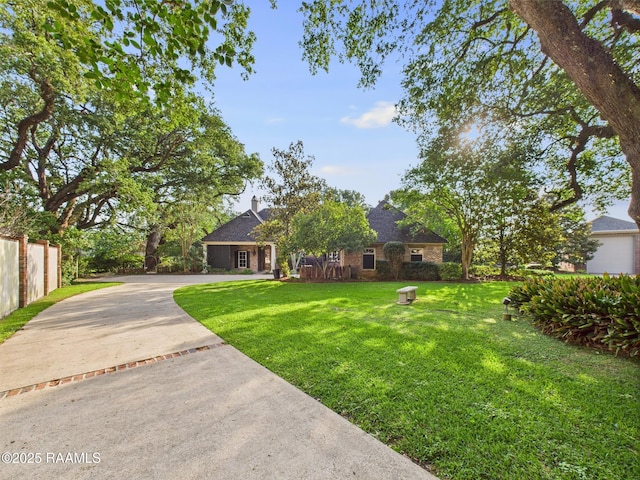 105 Oak Aly, Lafayette, LA 70508 - view of front of house featuring roof with shingles and driveway