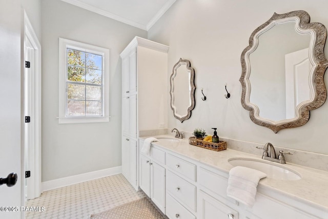 105 Oak Aly, Lafayette, LA 70508 - full bathroom with double vanity, crown molding, and baseboards