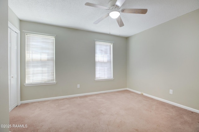 210 Long Plantation Blvd Unit U, Lafayette, LA 70508 - unfurnished room with carpet floors, a textured ceiling, baseboards, and ceiling fan