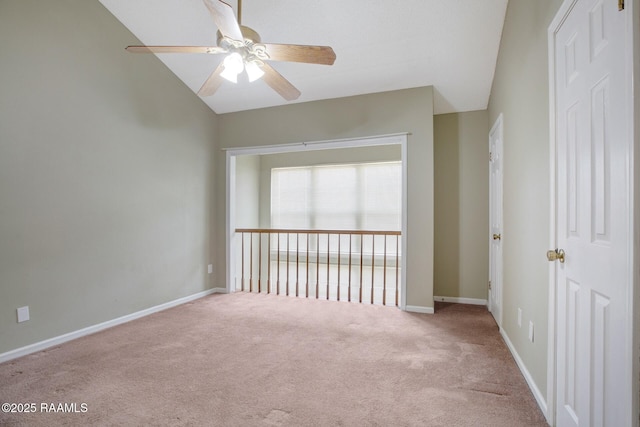 210 Long Plantation Blvd Unit U, Lafayette, LA 70508 - empty room featuring a ceiling fan, carpet, vaulted ceiling, and baseboards