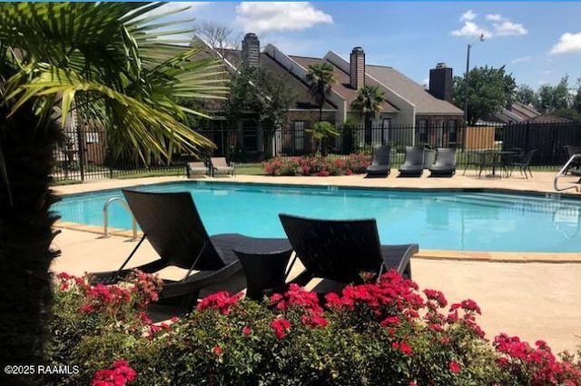 210 Long Plantation Blvd Unit U, Lafayette, LA 70508 - community pool with a patio area