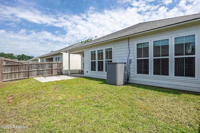 9036 Stonecroft Ave, Baton Rouge, LA 70810 - rear view of property with central AC unit and a patio area