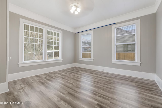 1323 Tarleton, Jeanerette, LA 70544 - empty room featuring crown molding, wood finished floors, and baseboards