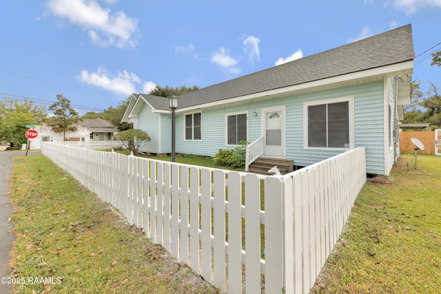 1323 Tarleton, Jeanerette, LA 70544 - view of front of house featuring roof with shingles