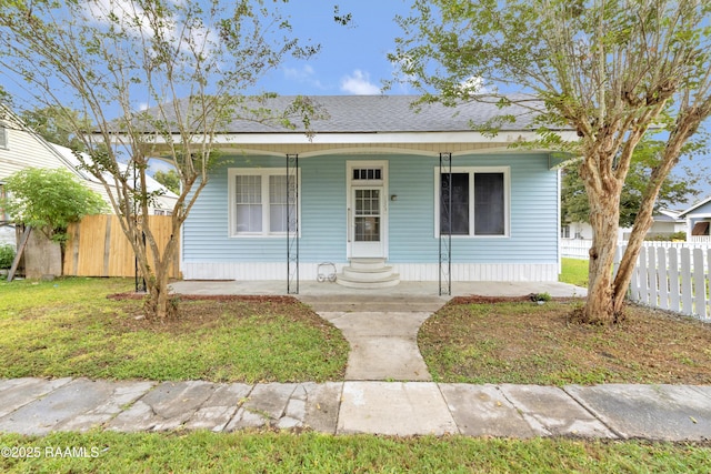 1323 Tarleton, Jeanerette, LA 70544 - view of front of property featuring a porch and roof with shingles