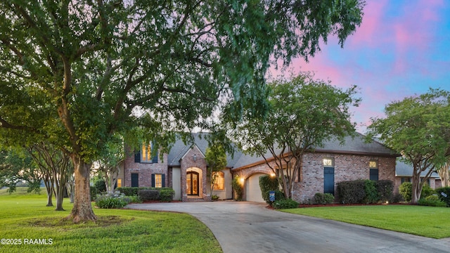 103 Masterspoint Dr, Broussard, LA 70518 - view of front of property with driveway, a lawn, and brick siding