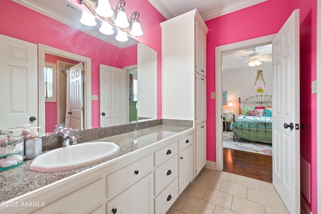 103 Masterspoint Dr, Broussard, LA 70518 - ensuite bathroom with tile patterned flooring, vanity, crown molding, and a ceiling fan