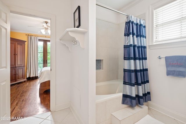 103 Masterspoint Dr, Broussard, LA 70518 - ensuite bathroom featuring a ceiling fan, crown molding, baseboards, tiled shower / bath combo, and french doors