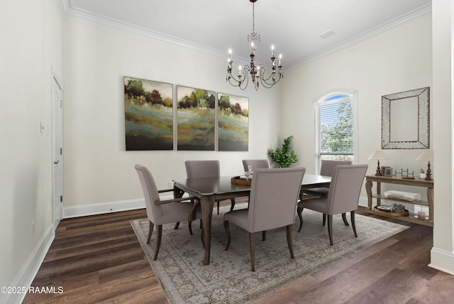 40400 Abby James Rd, Prairieville, LA 70769 - dining space with a chandelier, ornamental molding, dark wood finished floors, and baseboards