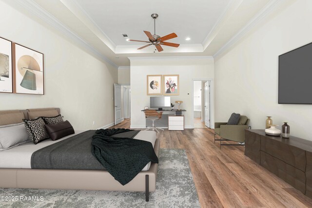 40400 Abby James Rd, Prairieville, LA 70769 - bedroom featuring wood finished floors, a raised ceiling, crown molding, recessed lighting, and a ceiling fan