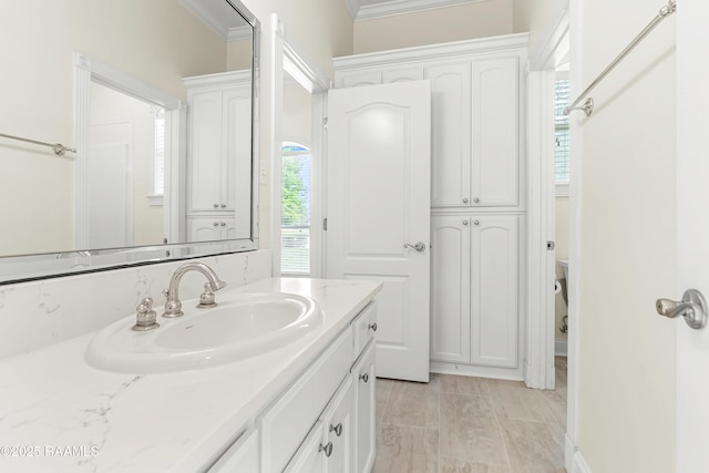 40400 Abby James Rd, Prairieville, LA 70769 - bathroom with vanity, crown molding, and marble look tiles