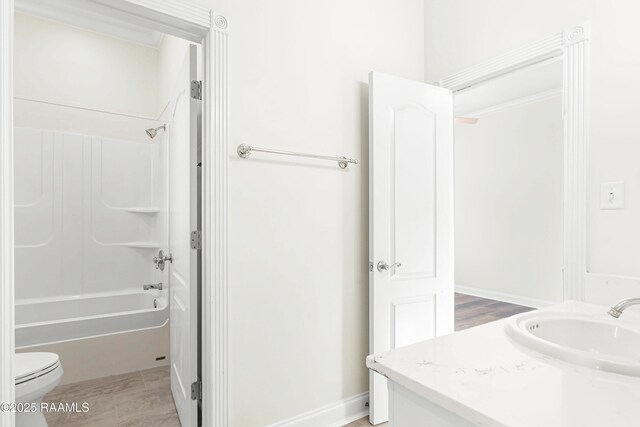 40400 Abby James Rd, Prairieville, LA 70769 - bathroom featuring toilet, vanity, and bathtub / shower combination