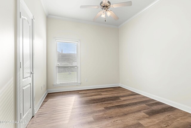 40400 Abby James Rd, Prairieville, LA 70769 - empty room with crown molding, wood finished floors, ceiling fan, and baseboards