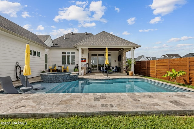 117 Big Lake Run, Youngsville, LA 70592 - view of pool featuring a patio area, a fenced backyard, and a pool with connected hot tub