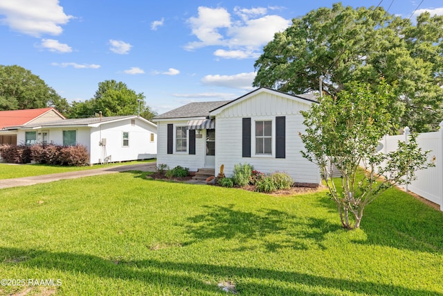 1617 Oscar St, Abbeville, LA 70510 - view of front facade featuring entry steps and a shingled roof