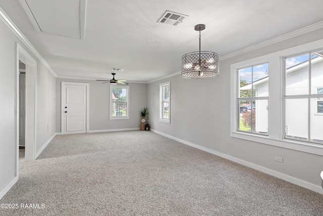 1617 Oscar St, Abbeville, LA 70510 - carpeted spare room with crown molding, baseboards, a chandelier, and a ceiling fan