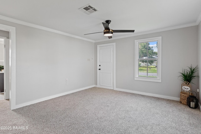 1617 Oscar St, Abbeville, LA 70510 - carpeted spare room featuring crown molding, ceiling fan, and baseboards