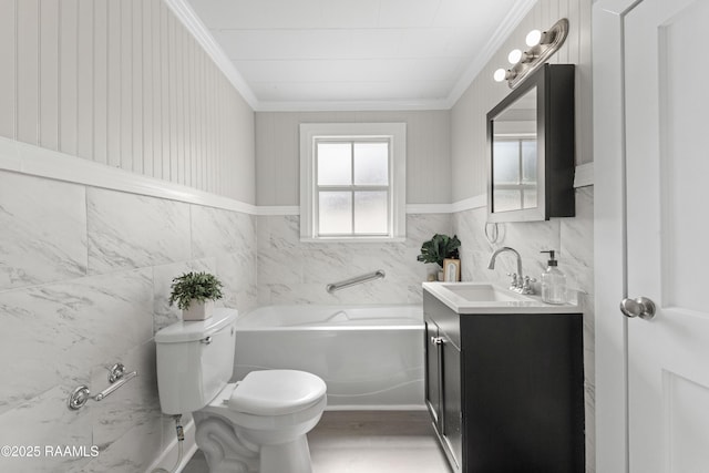 1617 Oscar St, Abbeville, LA 70510 - full bath with crown molding, a garden tub, vanity, tile walls, and toilet