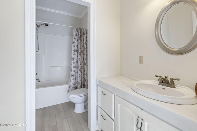 3785 Lake Breeze Rd, Lake Charles, LA 70605 - bathroom featuring toilet, wood finished floors, vanity, shower / bathtub combination with curtain, and ornamental molding