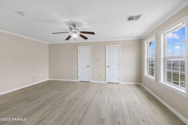 3785 Lake Breeze Rd, Lake Charles, LA 70605 - unfurnished room with light wood-style floors, healthy amount of natural light, baseboards, a smoke detector, and ornamental molding