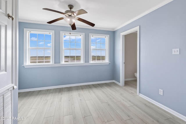 3785 Lake Breeze Rd, Lake Charles, LA 70605 - unfurnished room with ornamental molding, baseboards, light wood finished floors, and ceiling fan