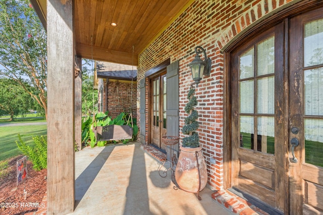 124 Edmund Ln, Eunice, LA 70535 - view of patio with french doors