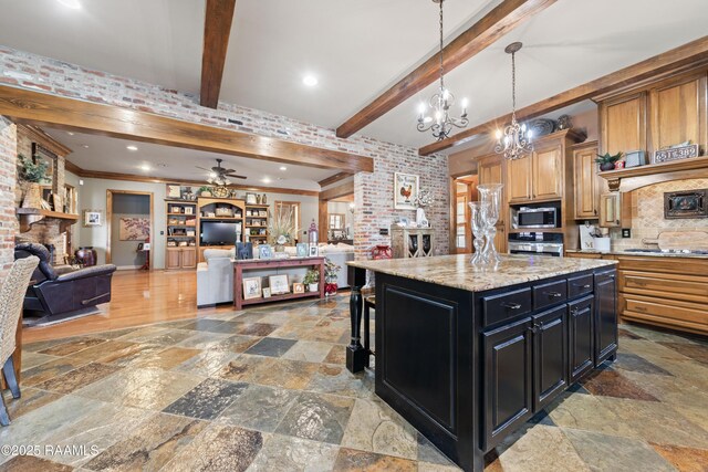 124 Edmund Ln, Eunice, LA 70535 - kitchen featuring appliances with stainless steel finishes, dark cabinets, open floor plan, beamed ceiling, and a fireplace