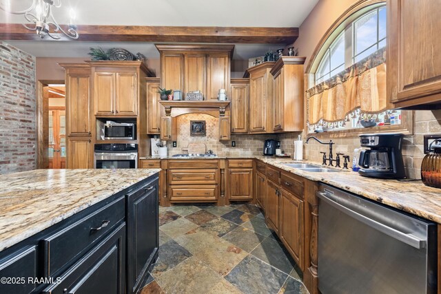 124 Edmund Ln, Eunice, LA 70535 - kitchen featuring appliances with stainless steel finishes, stone tile floors, a sink, beamed ceiling, and backsplash