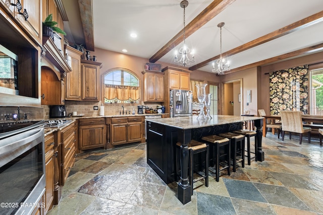 124 Edmund Ln, Eunice, LA 70535 - kitchen featuring stone tile floors, stainless steel fridge, a chandelier, beam ceiling, and tasteful backsplash