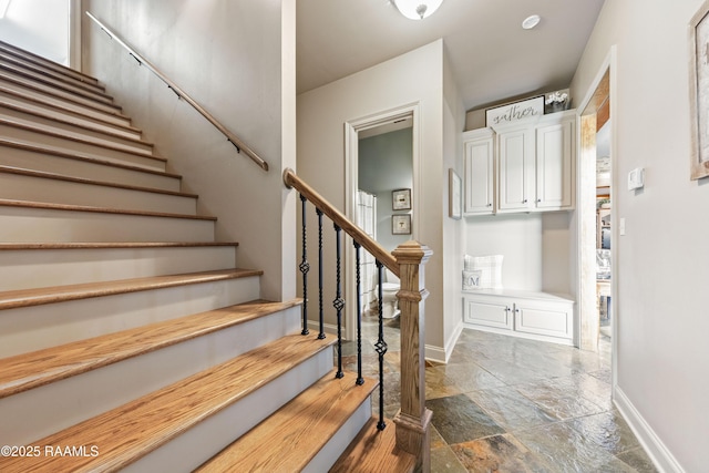 124 Edmund Ln, Eunice, LA 70535 - stairway with stone tile flooring and baseboards
