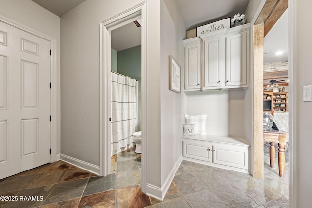 124 Edmund Ln, Eunice, LA 70535 - hall with stone tile floors and baseboards