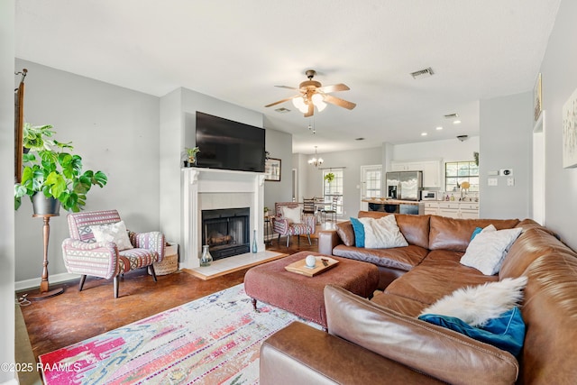 107 Westpointe Cir, Lafayette, LA 70506 - living room with ceiling fan, a fireplace with flush hearth, baseboards, and recessed lighting